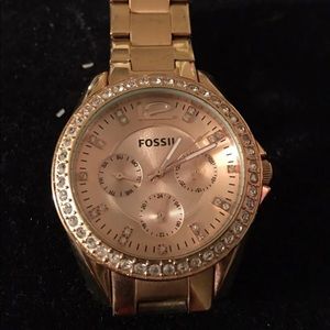 Gold fossil watch